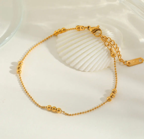Delicate Gold Bead Station Bracelet