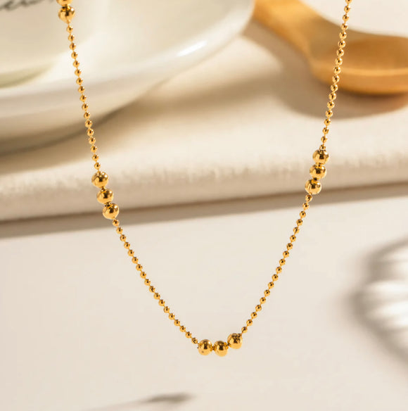 Delicate Gold Bead Station Necklace