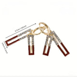 Gilded Geometric Drop Earrings