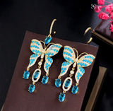 Blue Butterfly Dangle Earrings With Cubic Zirconia Pavé