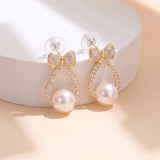 Pearl and Bow Drop Earrings
