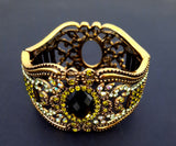 Gold Bangle Bracelet with Intricate Detail